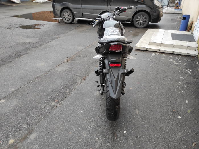 Электромотоцикл недорого вид сзади